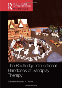 Book Cover-Routledge International Handbook of Sandplay Therapy